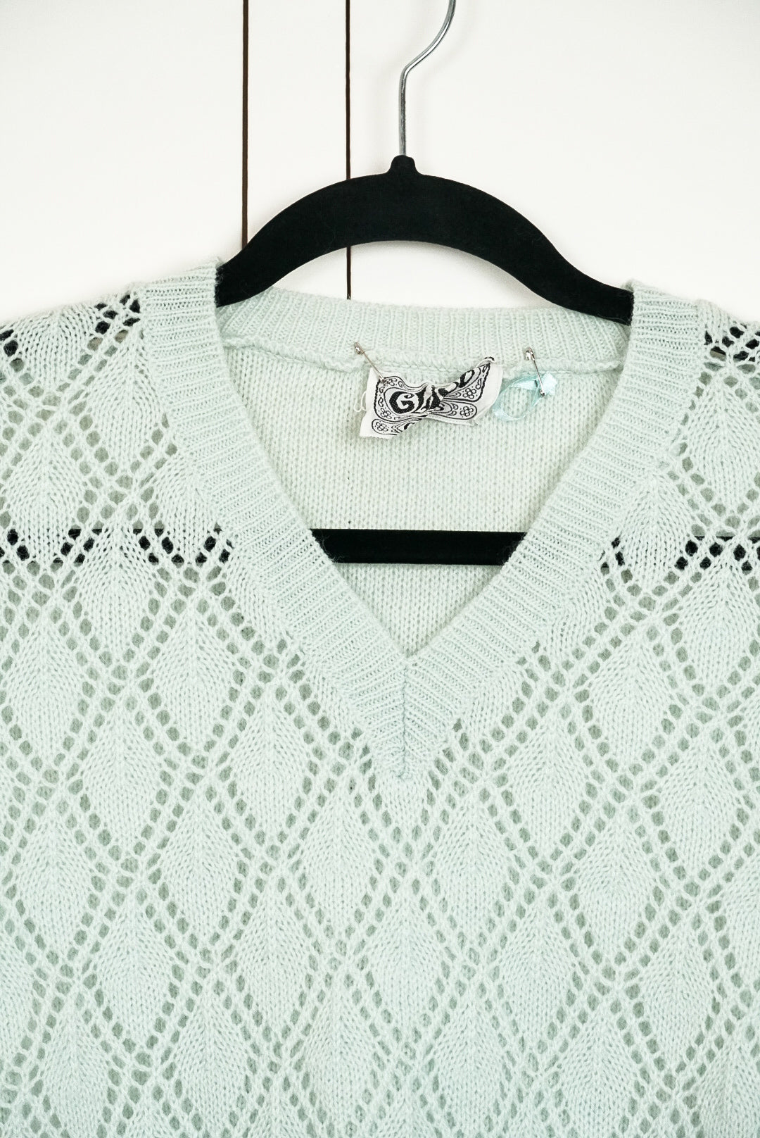 Top en maille sans manche vert pale