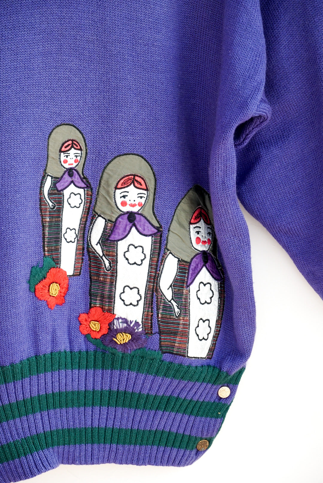 Pull violet poupées russes