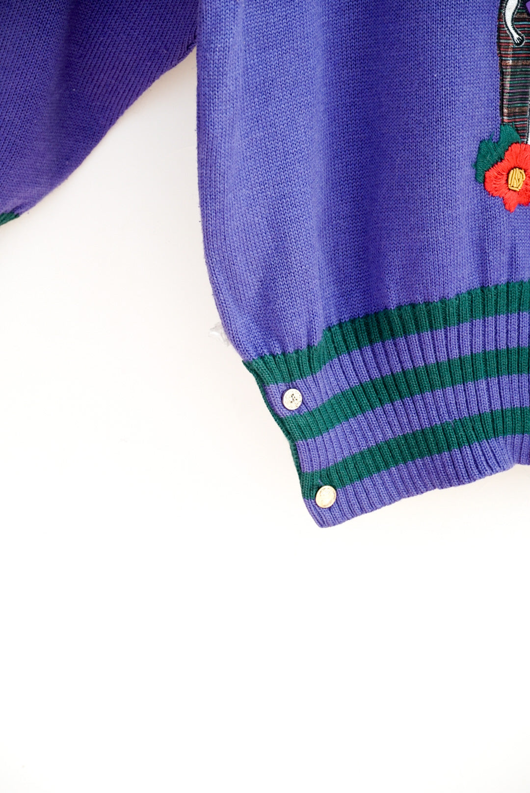 Pull violet poupées russes