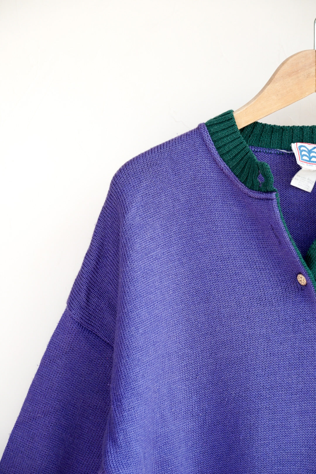 Pull violet poupées russes
