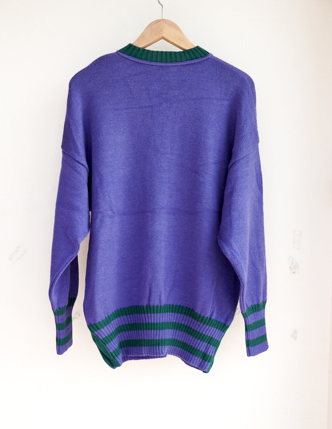 Pull violet poupées russes