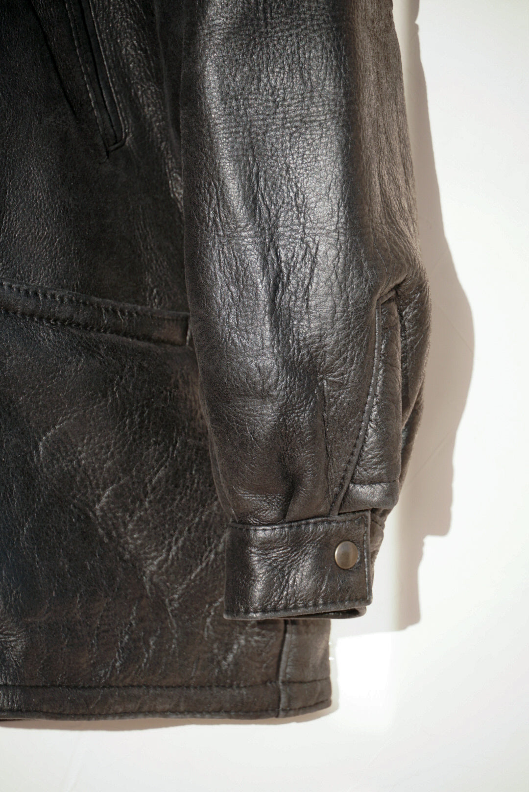 Manteau noir peau lainée à capuche