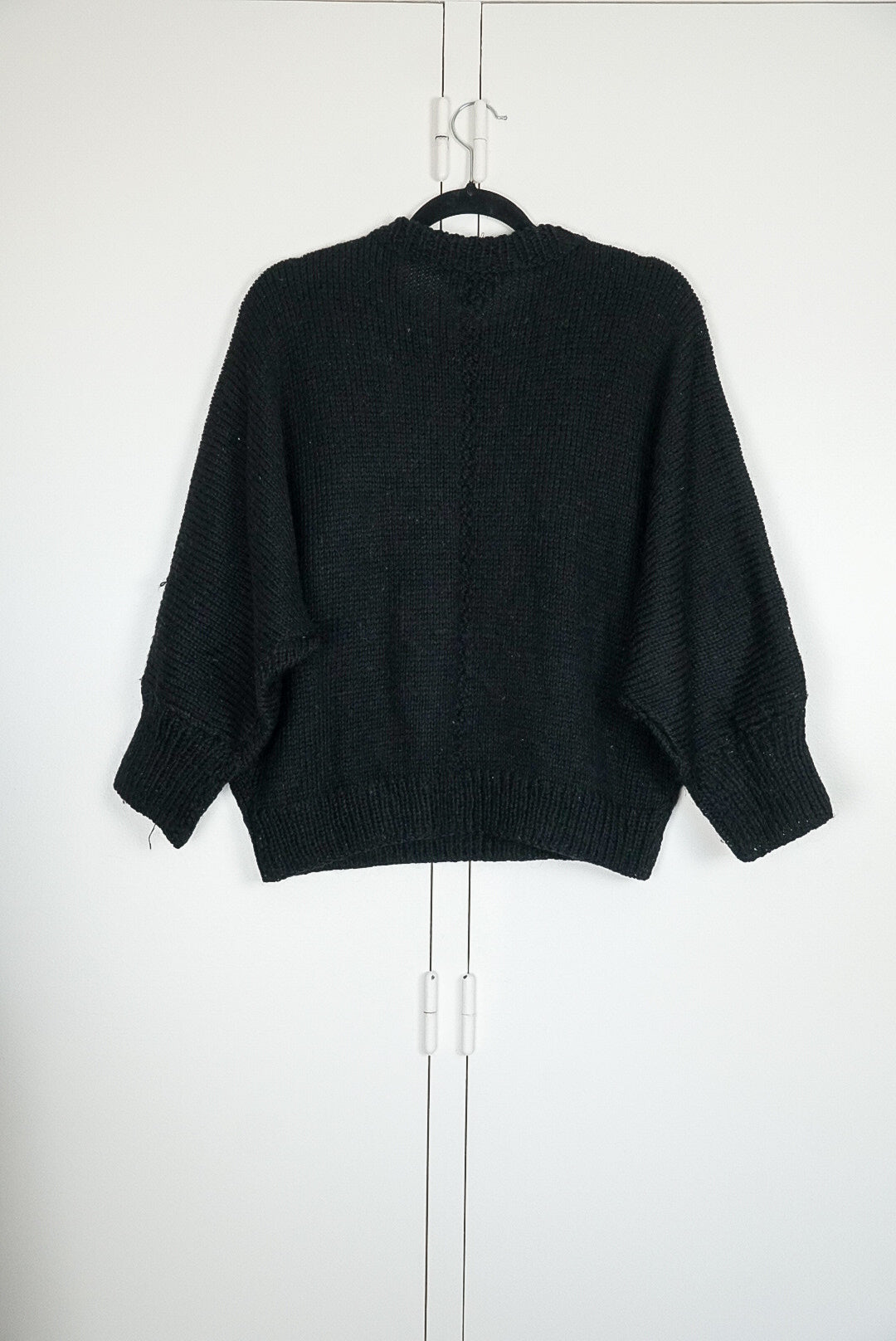 Pull noir bordée