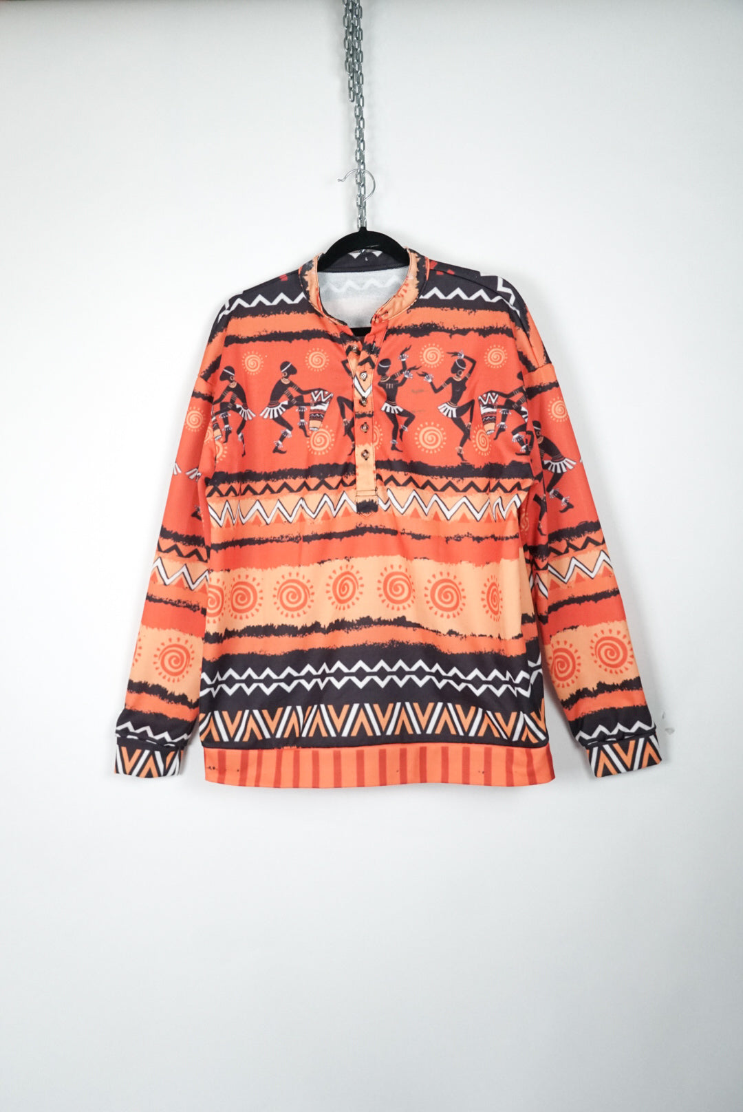 Pull orange a motif africains