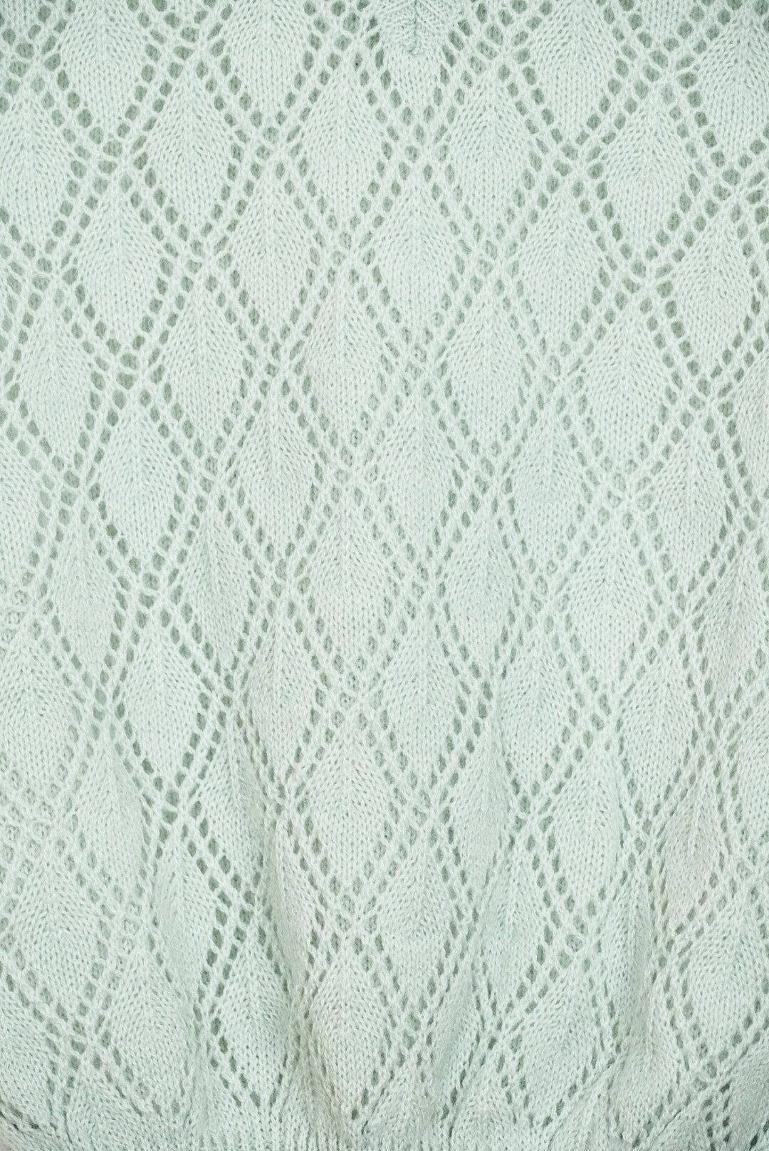 Top en maille sans manche vert pale
