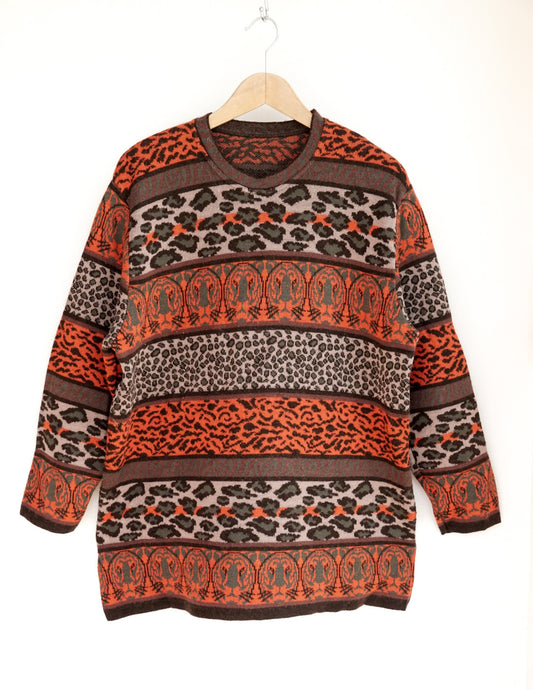 Pull orange à motif animal